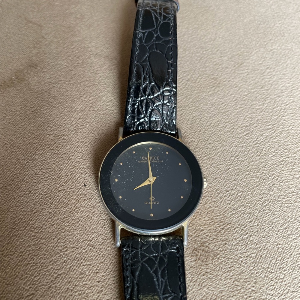 Watch with Black and Gold Face